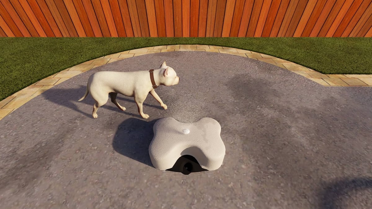 dog bone water feature for a dog splash pad design